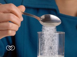 simpatia do copo de agua com acucar
